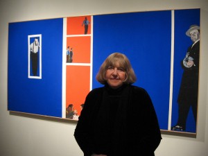 Rosalyn Drexler at the opening, in front of her painting Home Movies, 1963, oil and synthetic polymer with photomechanical, reproductions on canvas, Courtesy Hirshhorn Museum and Sculpture Garden, Washington, DC