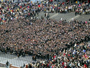 University of Michigan graduation. Football crowds often do the human wave, another way to move together in time.