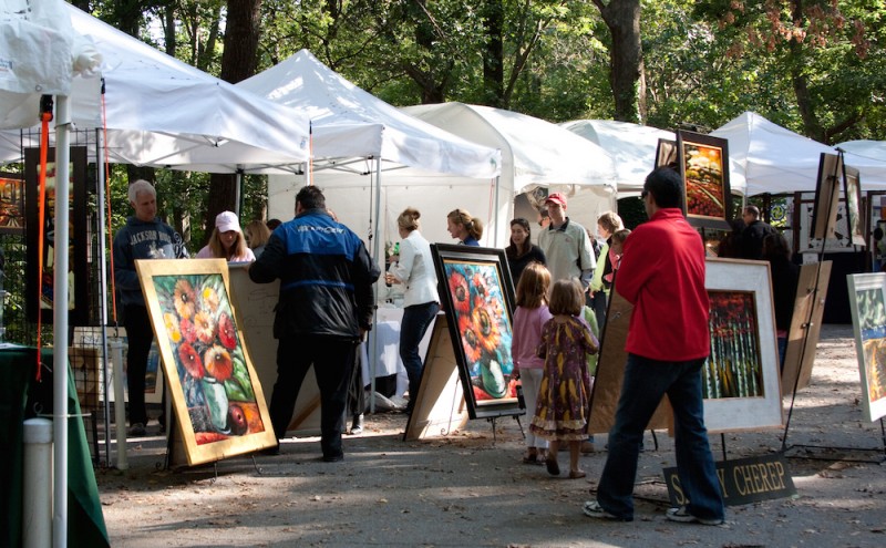 Many art booths at an outdoor art fair