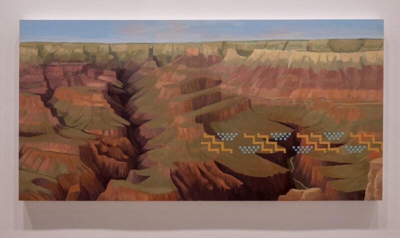 A beautiful realist painting of the American Grand Canyon, with superimposition of Native symbols, representing the peoples who used to live there or are buried there, in a pattern running in the right foreground.